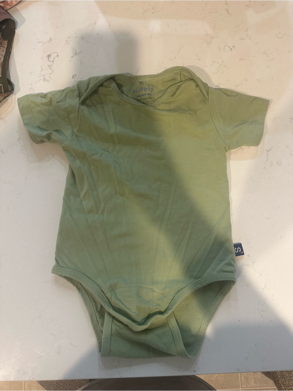 Magnetic Me bodysuit
